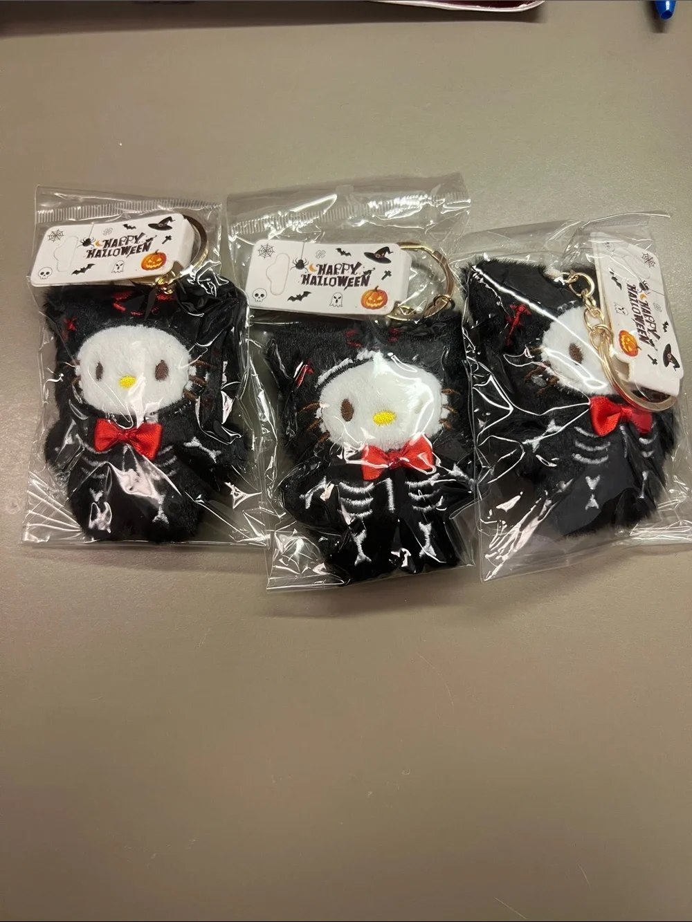 Hello Kitty Happy Halloween Black Plush Cat Costume Keychain with Red Bow